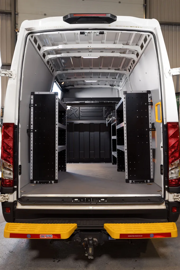Fully racked welfare van interior viewed through the rear doors