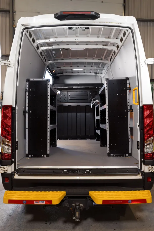 Fully racked welfare van interior viewed through the rear doors
