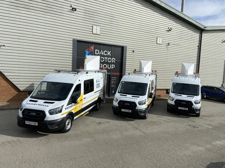 Chevron EMCC vans outside the Dack Motor Group conversion centre